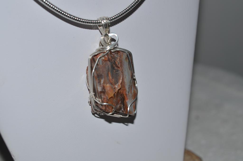 Wire wrapped copper pendant with petrified wood
